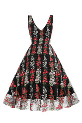 Schwarzes ärmelloses elegantes Vintage Kleid mit floraler Spitzenstickerei